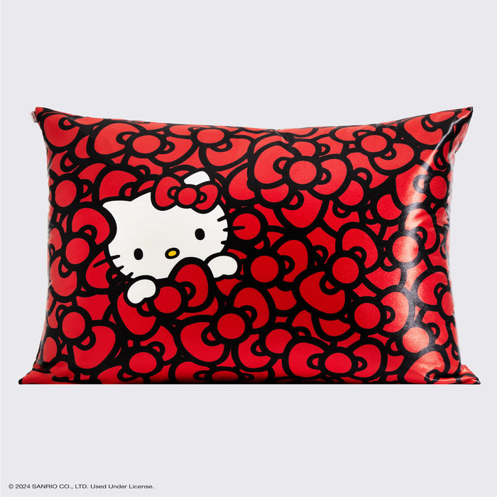 Kitsch x Hello Kitty Taie d'oreiller en satin - Hello Kitty se baigne dans une mer de nœuds